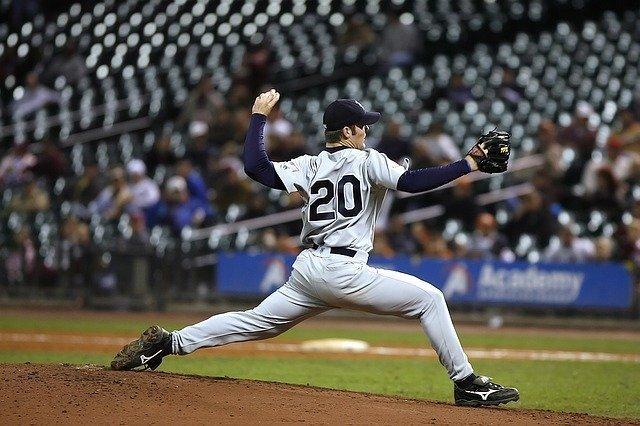 mlb baseball pitcher shown at foot strike